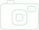 Light green outline of camera icon