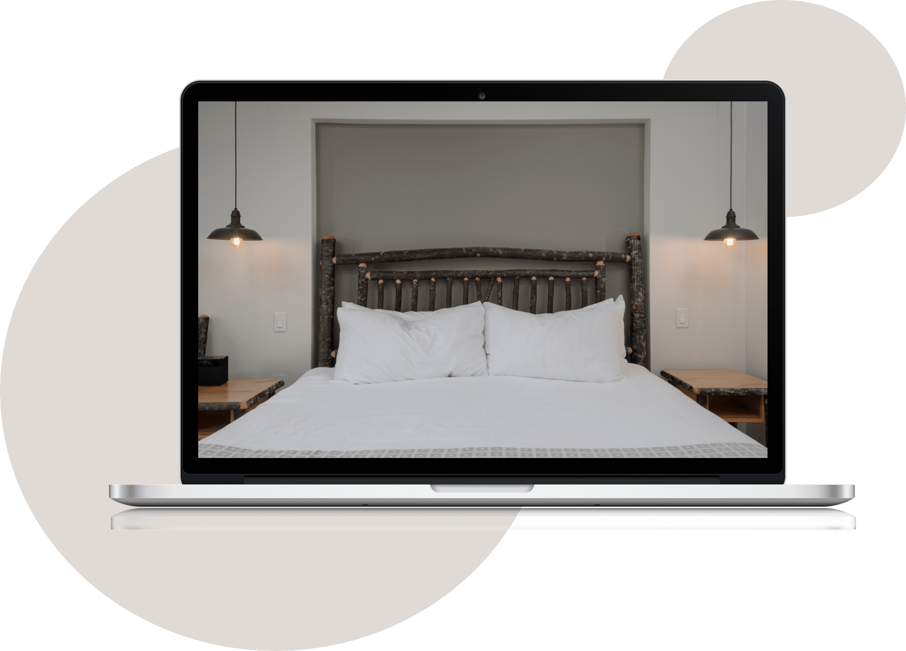 Black and silver Macbook with image of Tigh-Na-Mara Resort Queen bed with realistic wood bedframe on screen